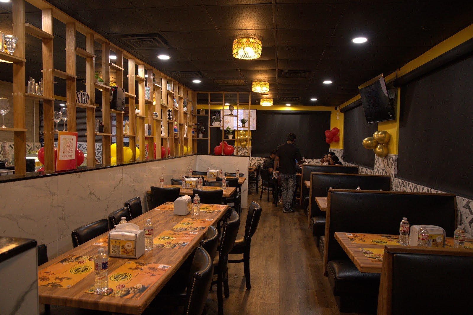 Dining tables at House of Biryanis and Kebabs Frisco